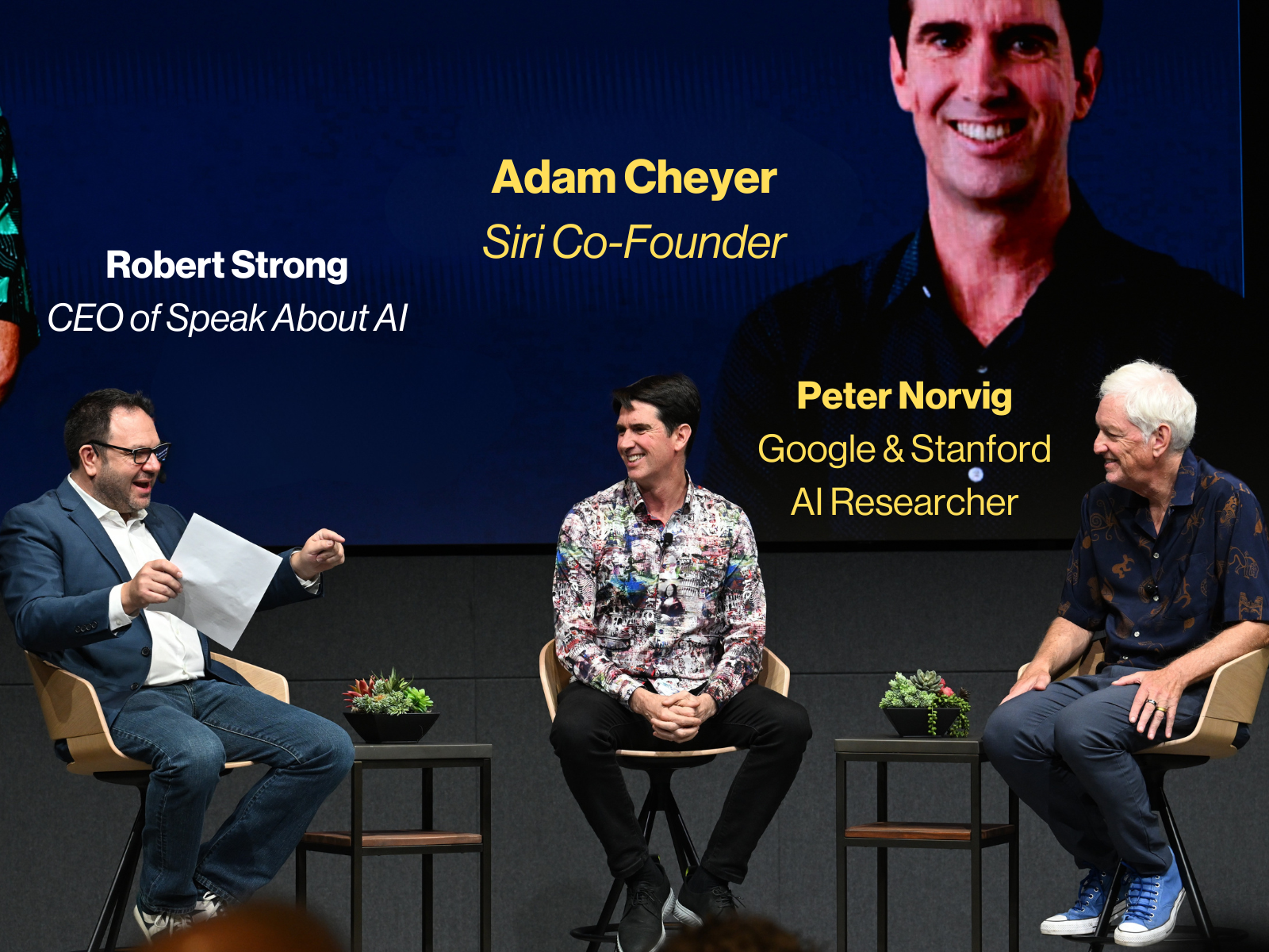 Robert Strong, Adam Cheyer (Siri Co-Founder), and Peter Norvig (Google & Stanford AI Researcher) on stage at a Microsoft event